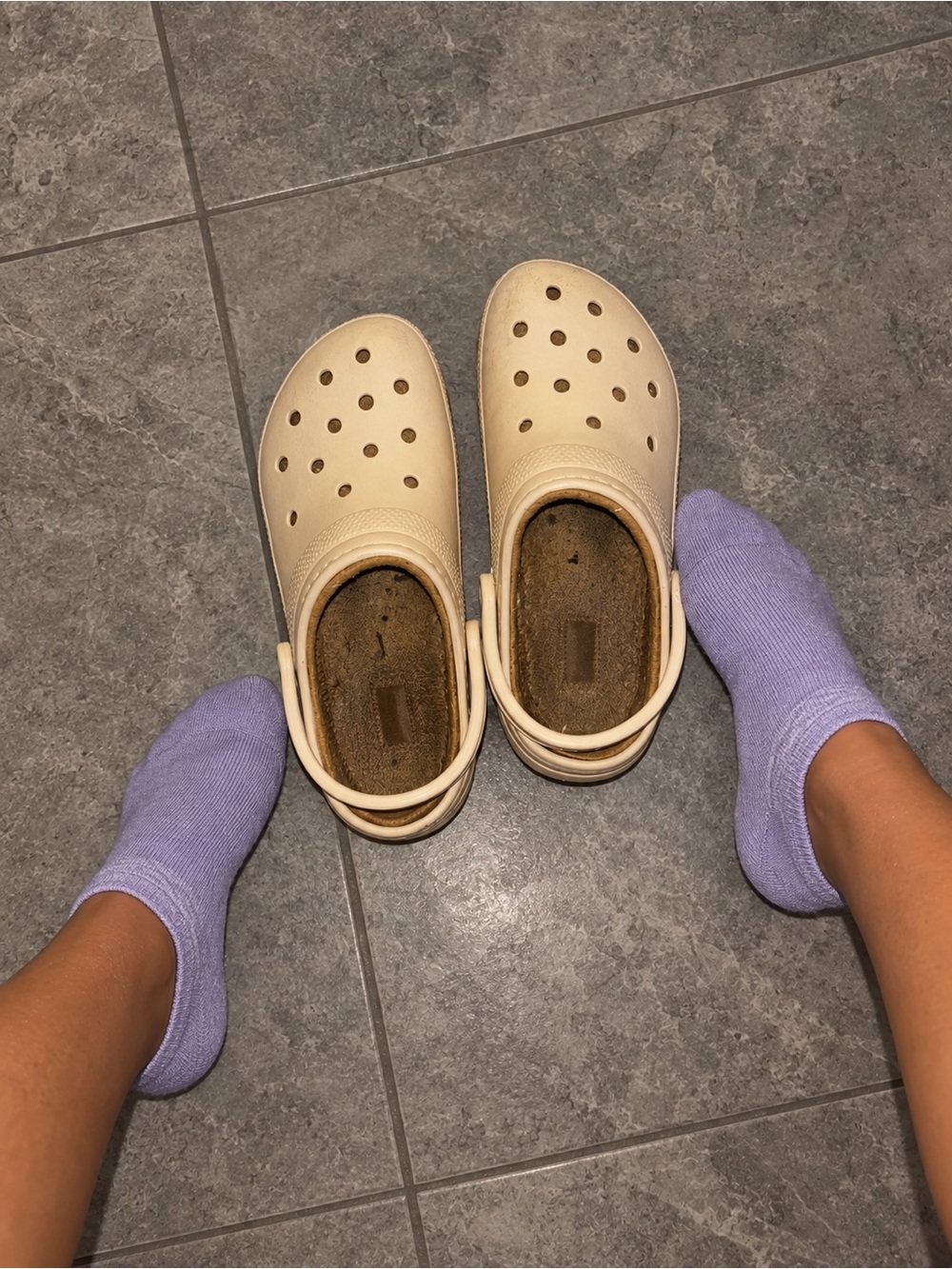 Woman’s worn Crocs